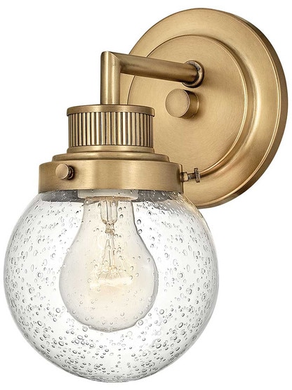 Poppy 1-Light Bath Sconce in Heritage Brass.